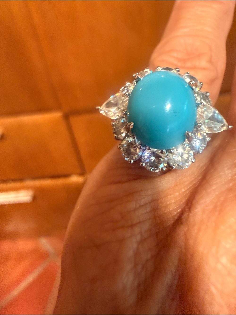 Turquoise Cabochon Halo Ring with Clear Stone Accents